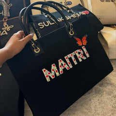Black Embellished Tote Bag with Butterfly Motif and Chain Handles