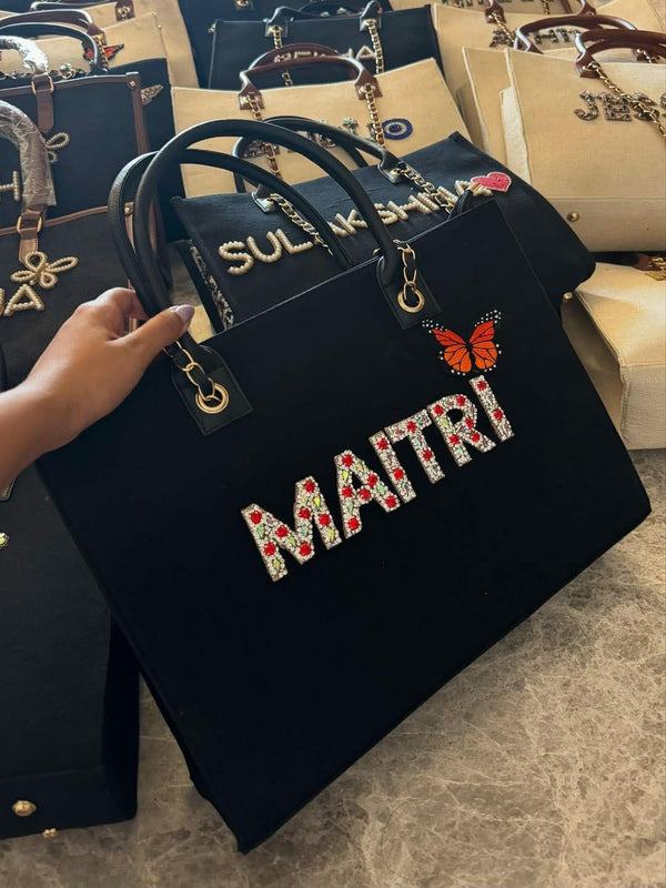 Black Embellished Tote Bag with Butterfly Motif and Chain Handles